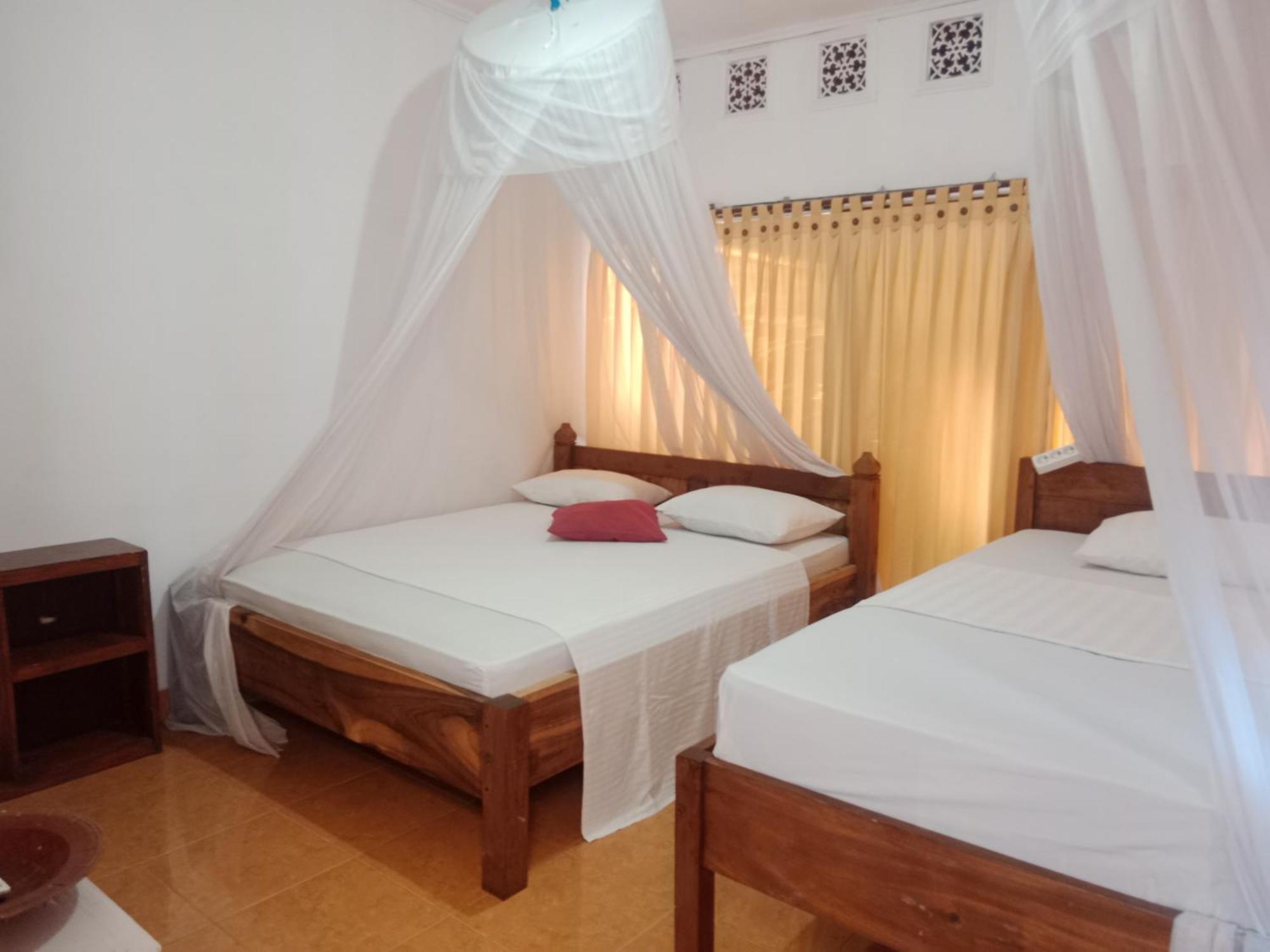 Fullesguesthouse กีลีตราวางัน ภายนอก รูปภาพ